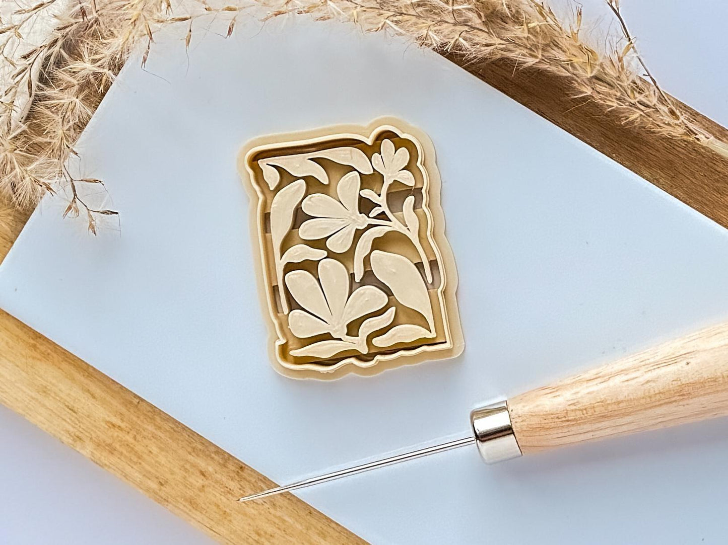 Beige clay cutter abstract floral design