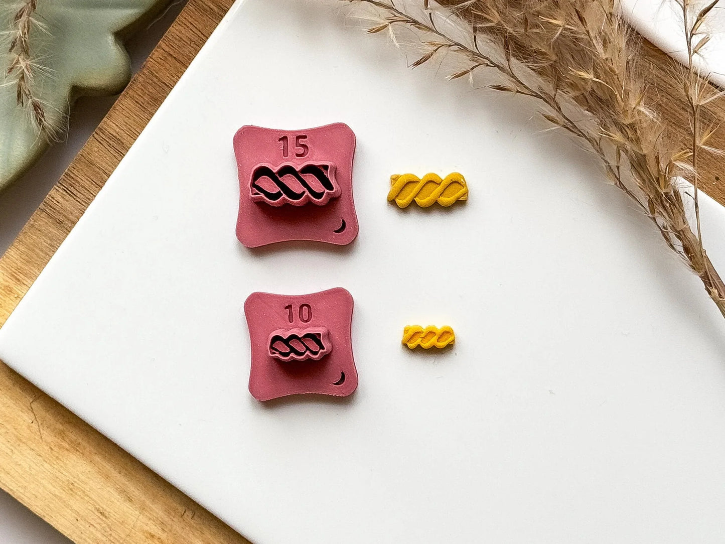 Micro fusilli pasta clay cutter, with mini pasta clay shapes cut using the clay tool.