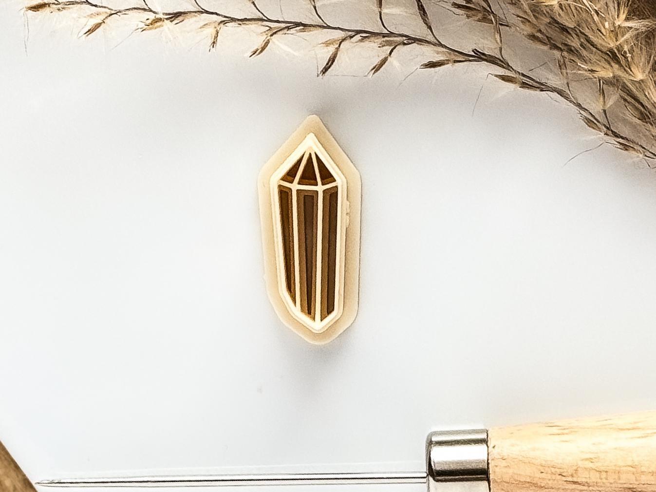 beige coloured crystal cutter
