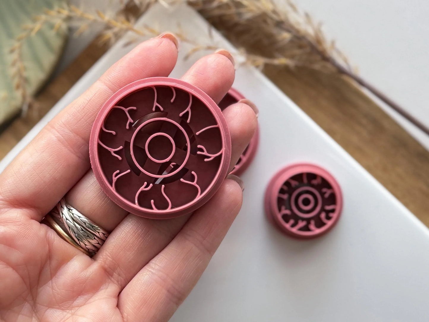 40mm eyeball shaped round clay cutter in hand for scale