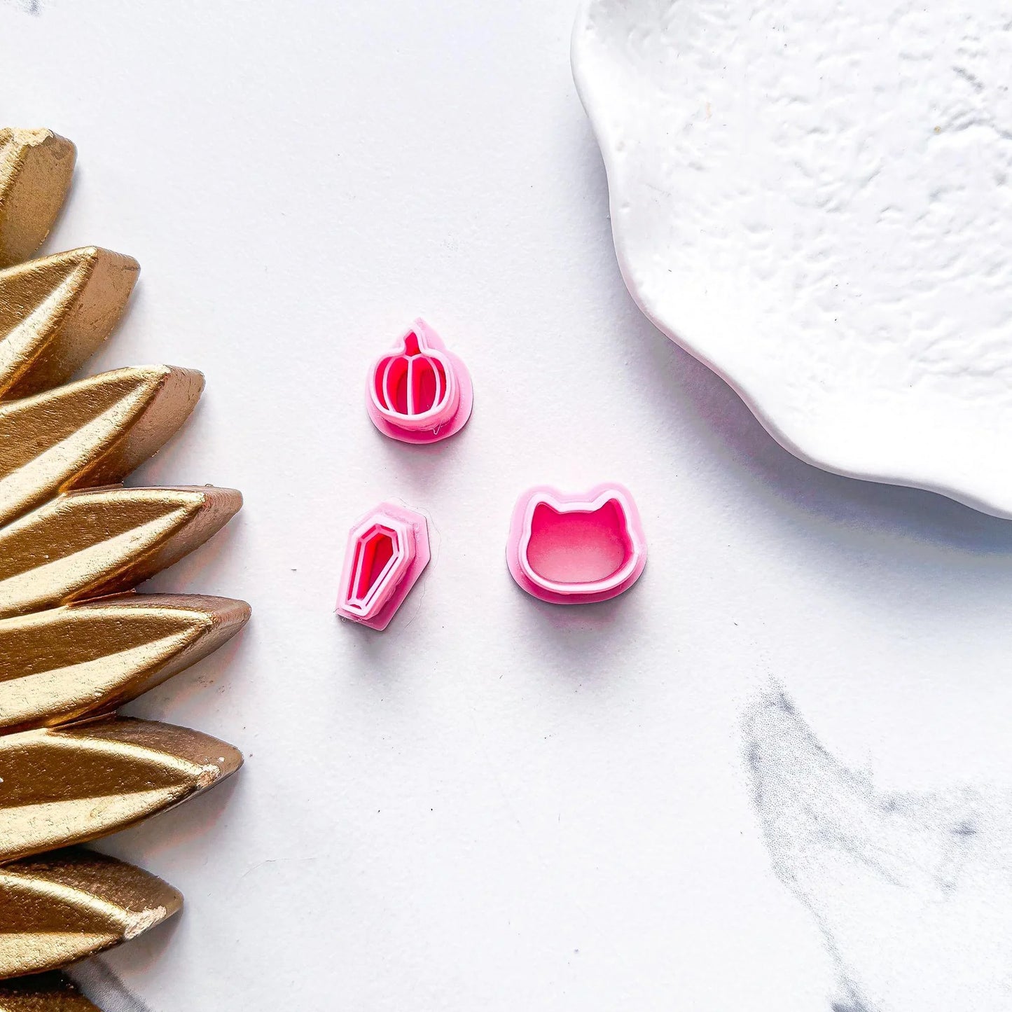 Micro 13mm Halloween Clay Cutter Selection in Pink. pumpkin, cat and coffin cutter shown in bubblegum pink pla material.