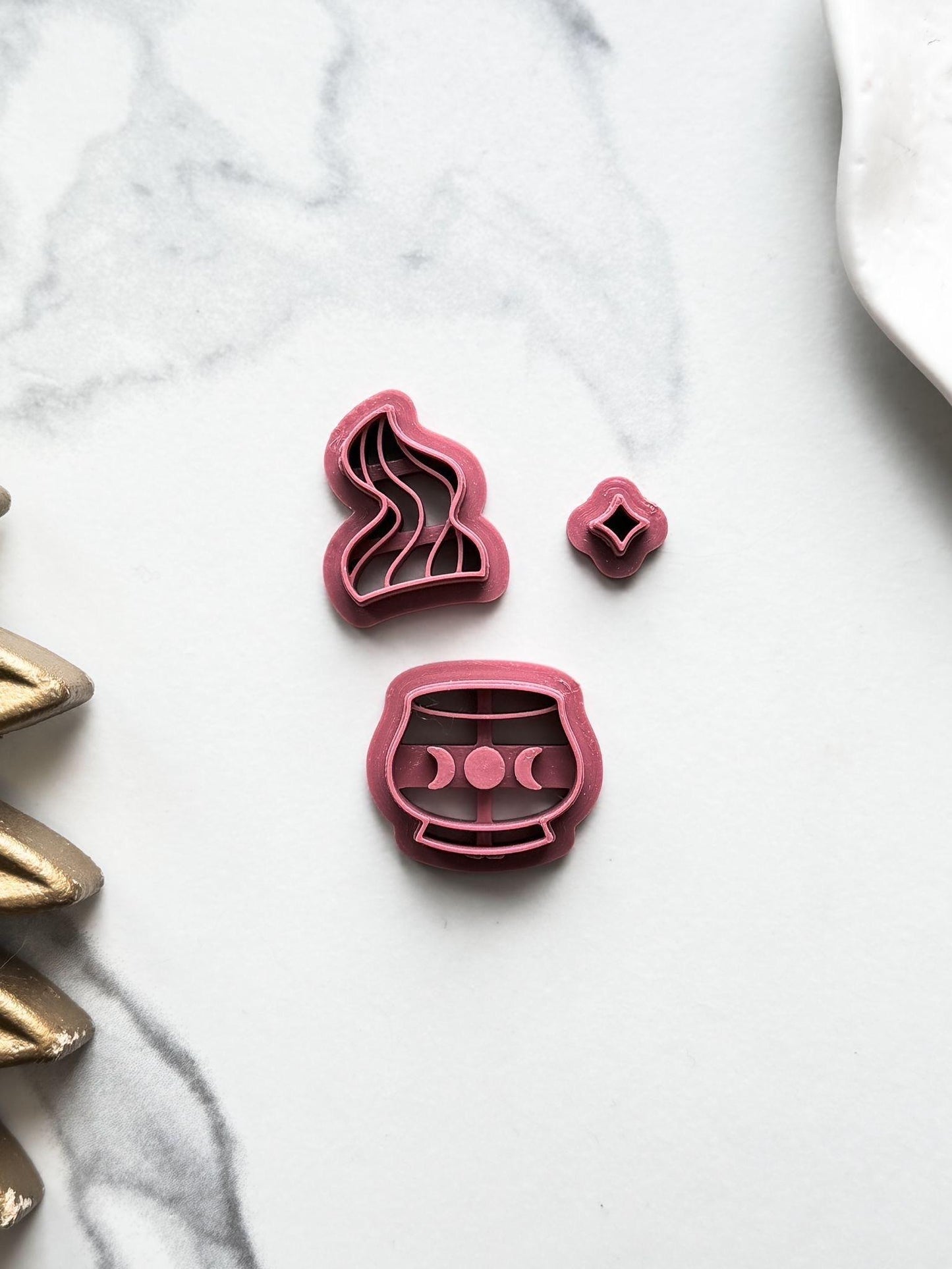 dark matte pink cauldron clay cutter set