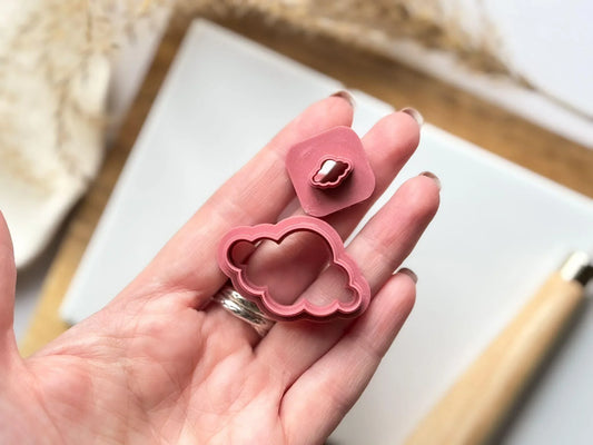 fluffy cloud clay cutters in hand for scale
