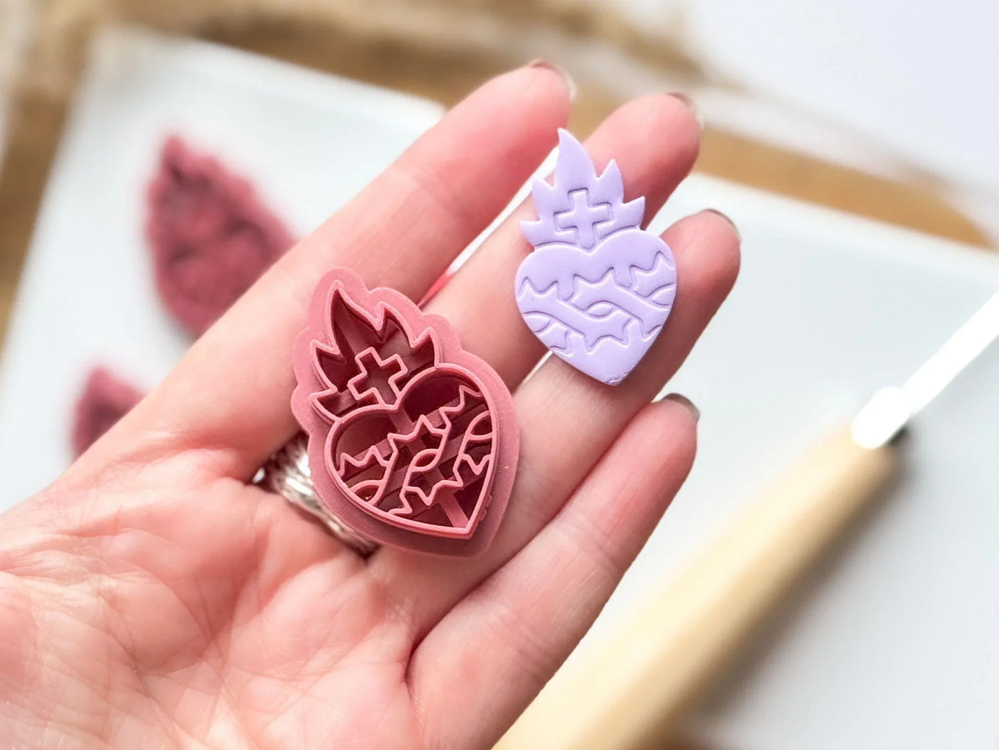 sacred heart polymer clay cutter in hand