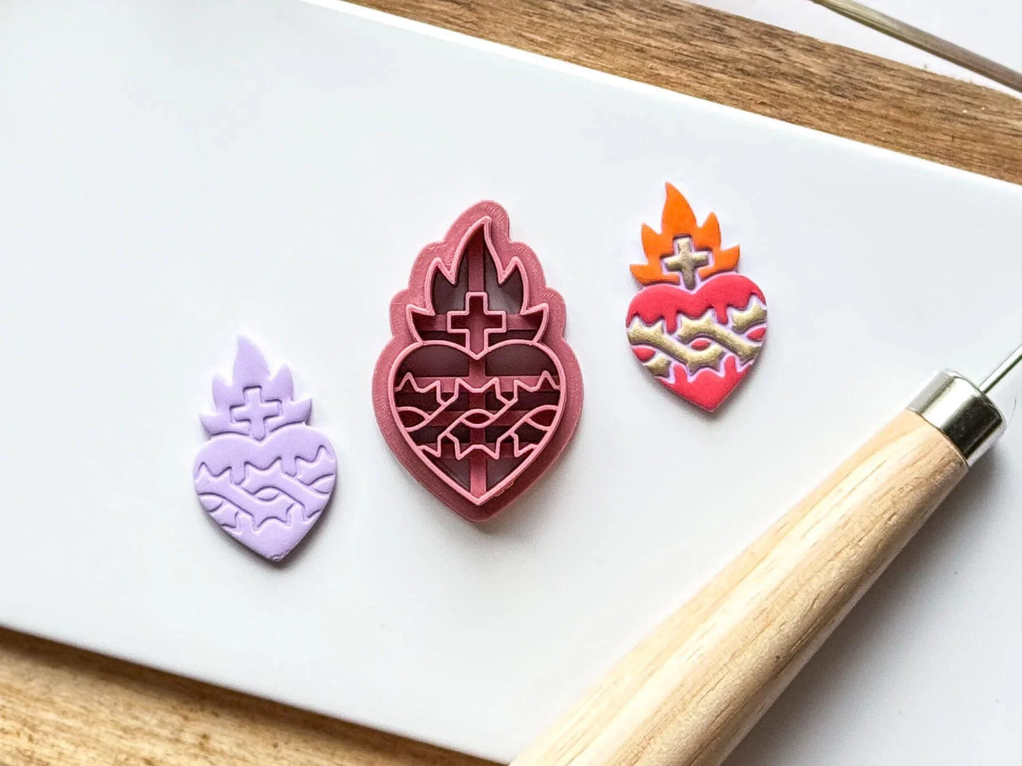 Close up of sacred heart gothic clay cutters