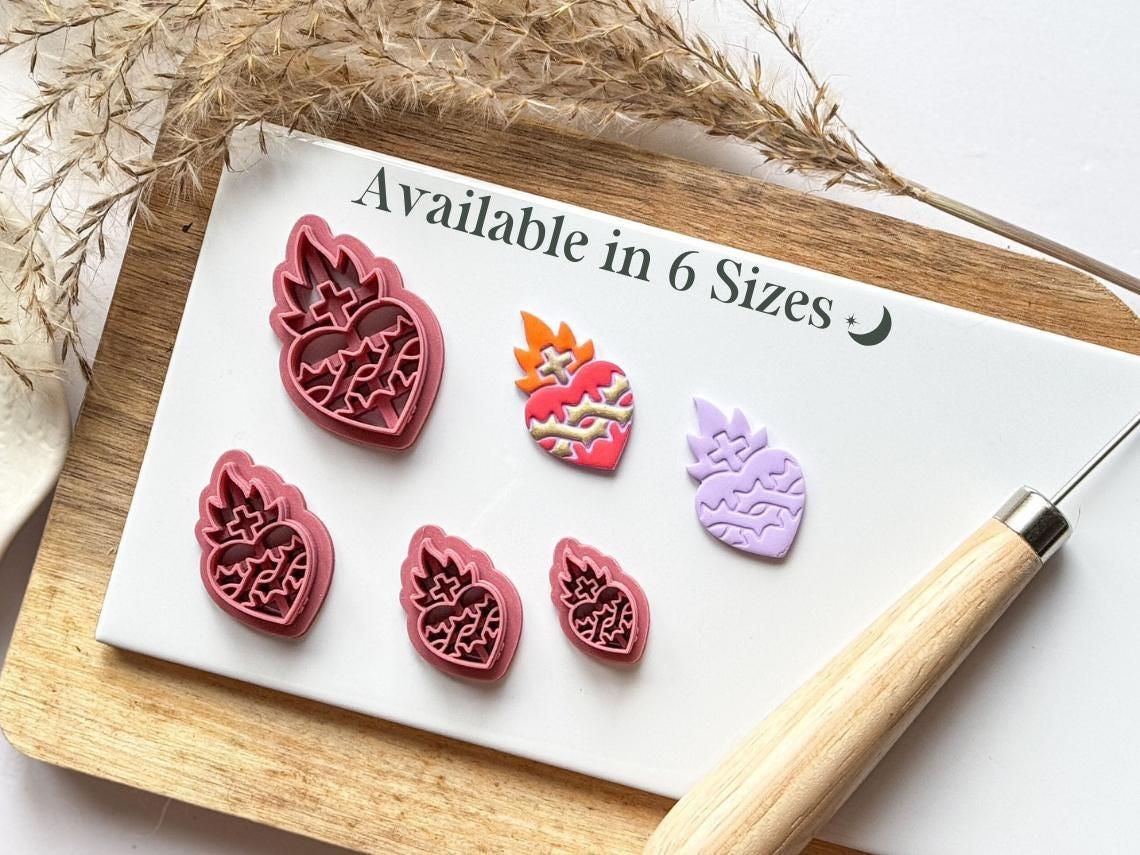 Flaming sacred heart polymer clay cutters with samples and size options