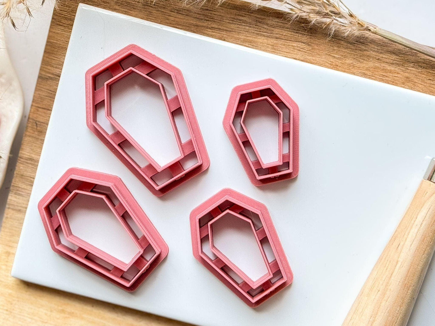 Coffin polymer clay cutter with single imprint line on tile