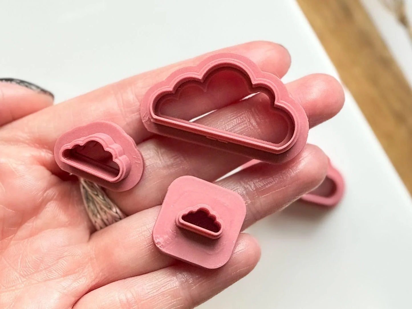 Cloud clay cutters in hand