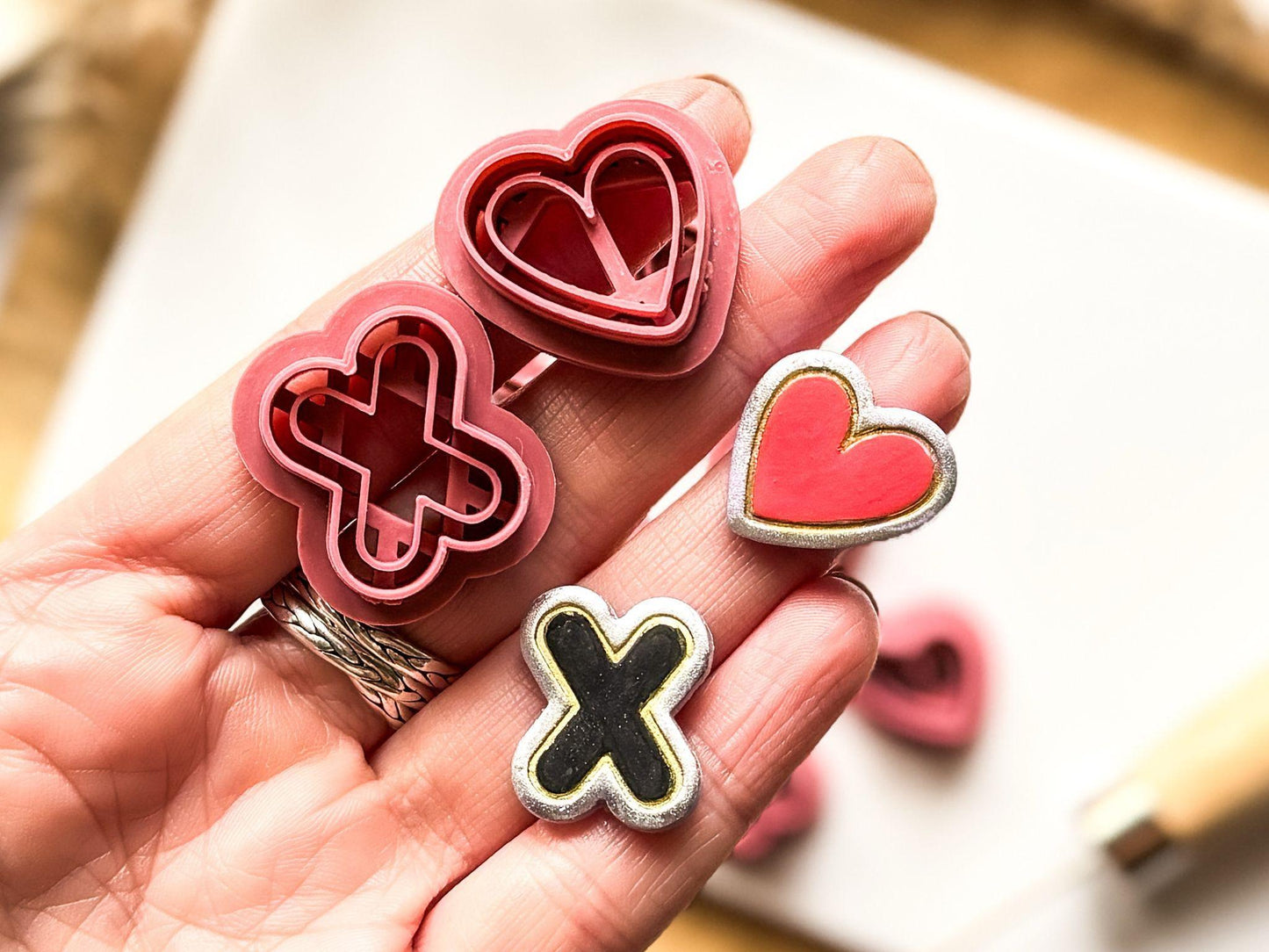 XO polymer clay cutter in hand with sample