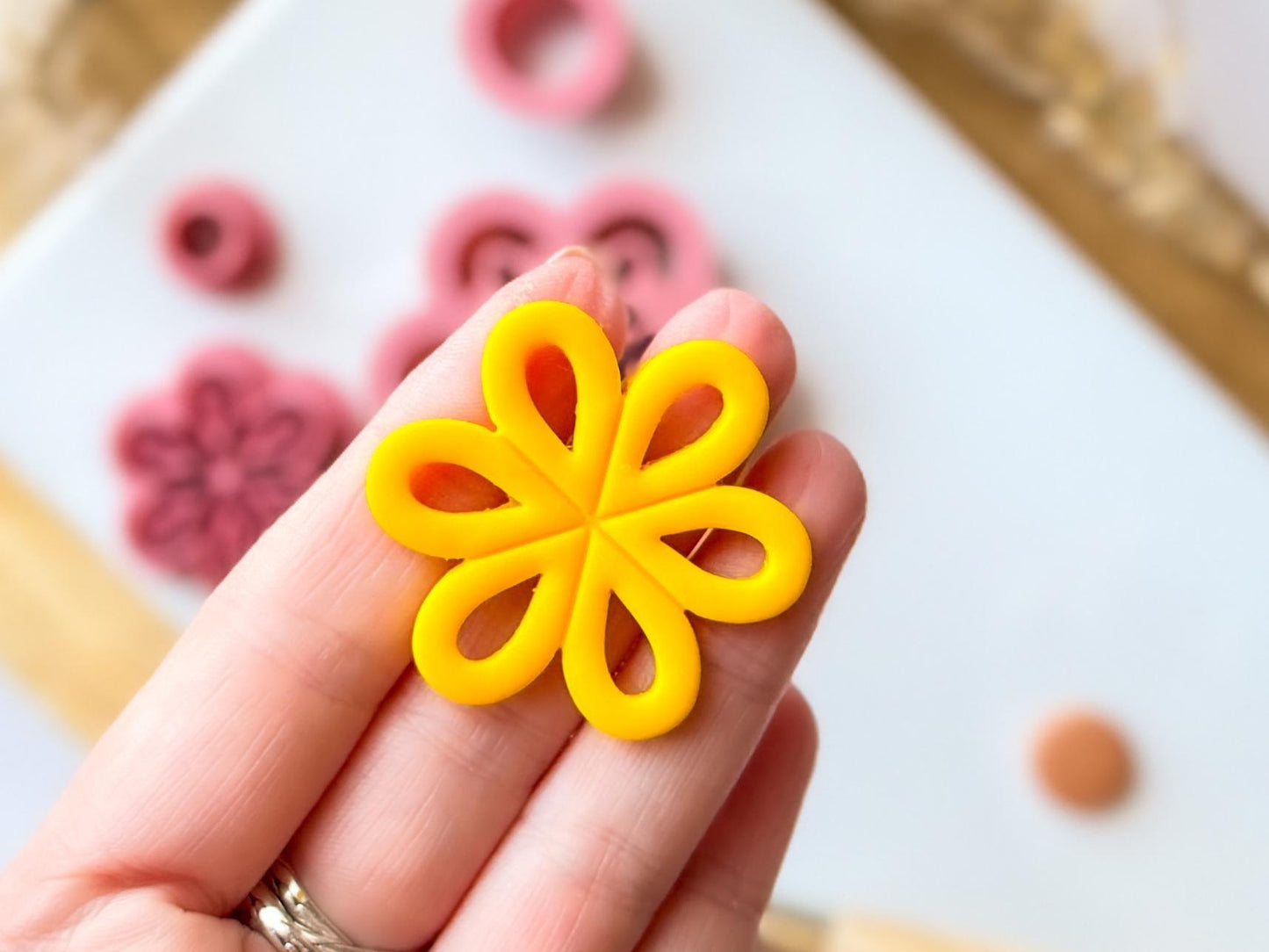 Close up of cut out clay flower