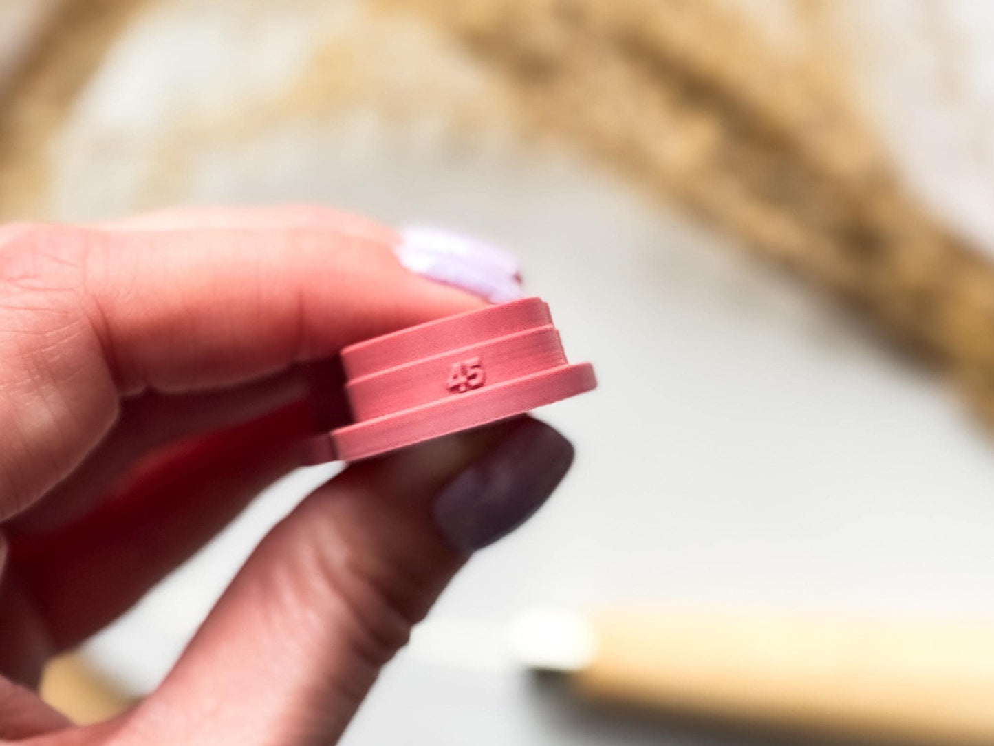 polymer clay cutter with size printed on the side