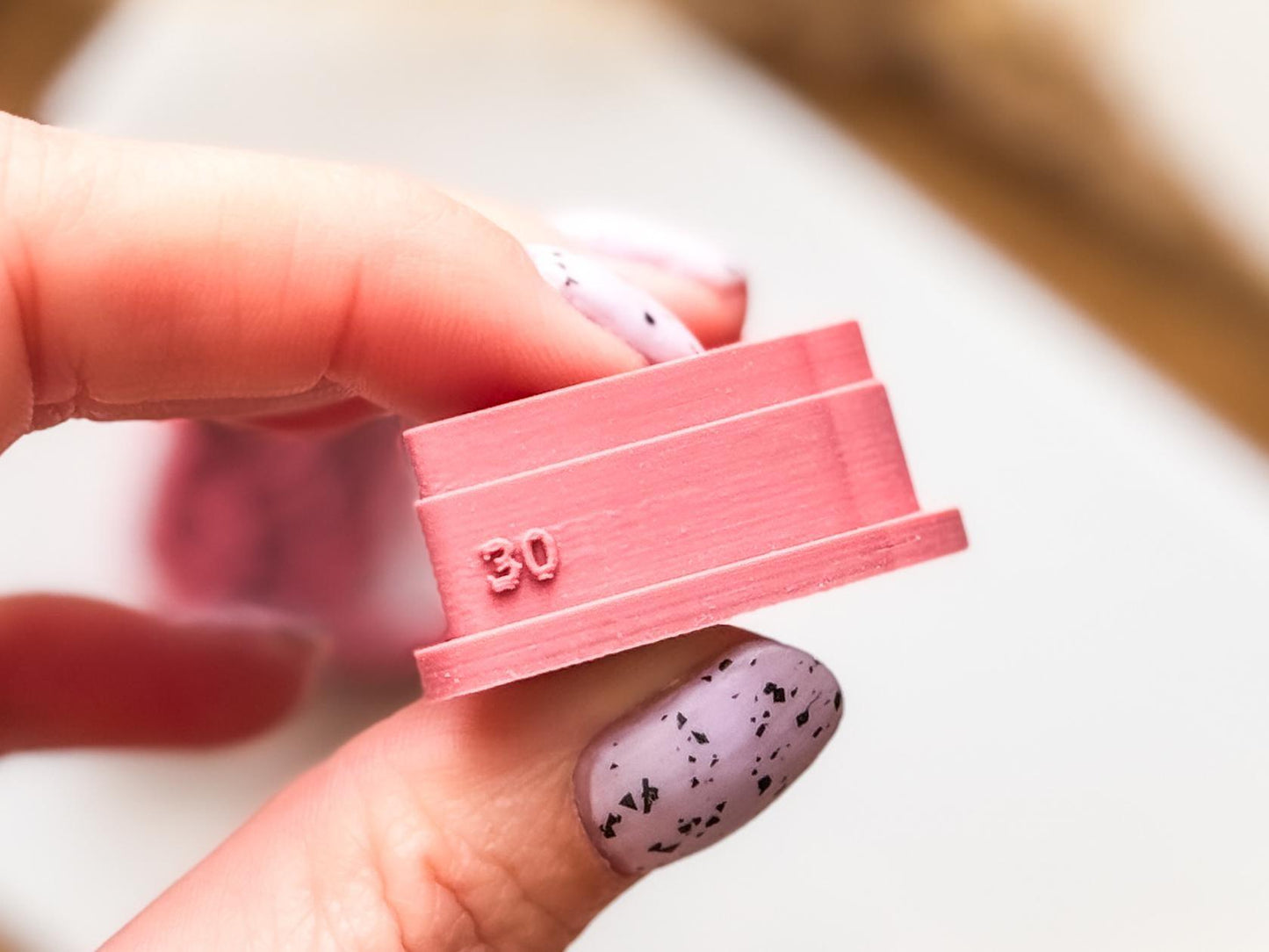 pink clay cutter with the size printed on the side