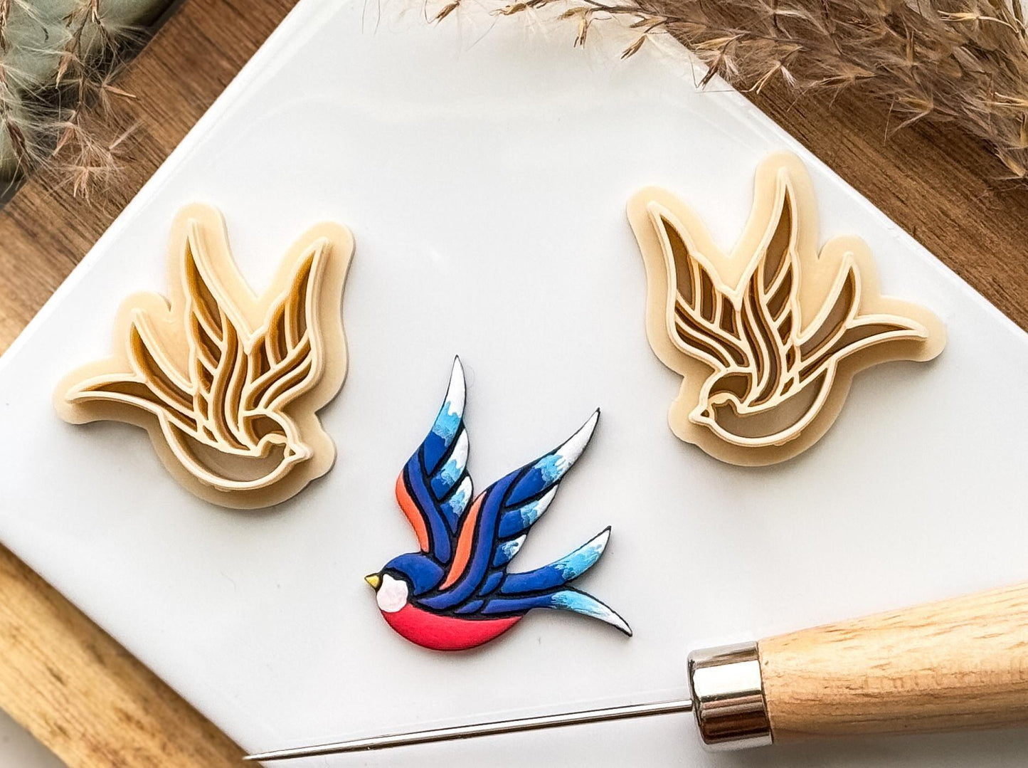 Beige mirrored pair of sparrow bird clay cutters