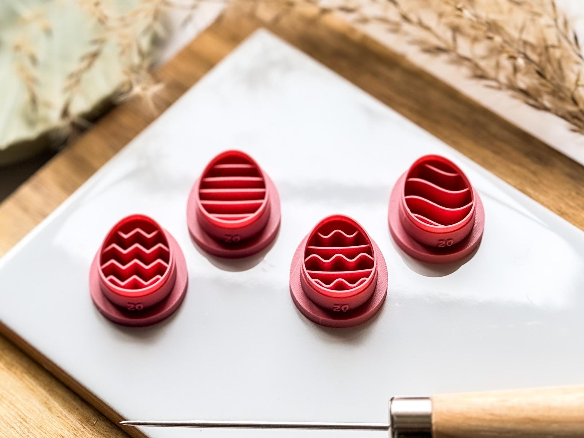 Side view of easter egg clay cutter set showing depth of imprint lines
