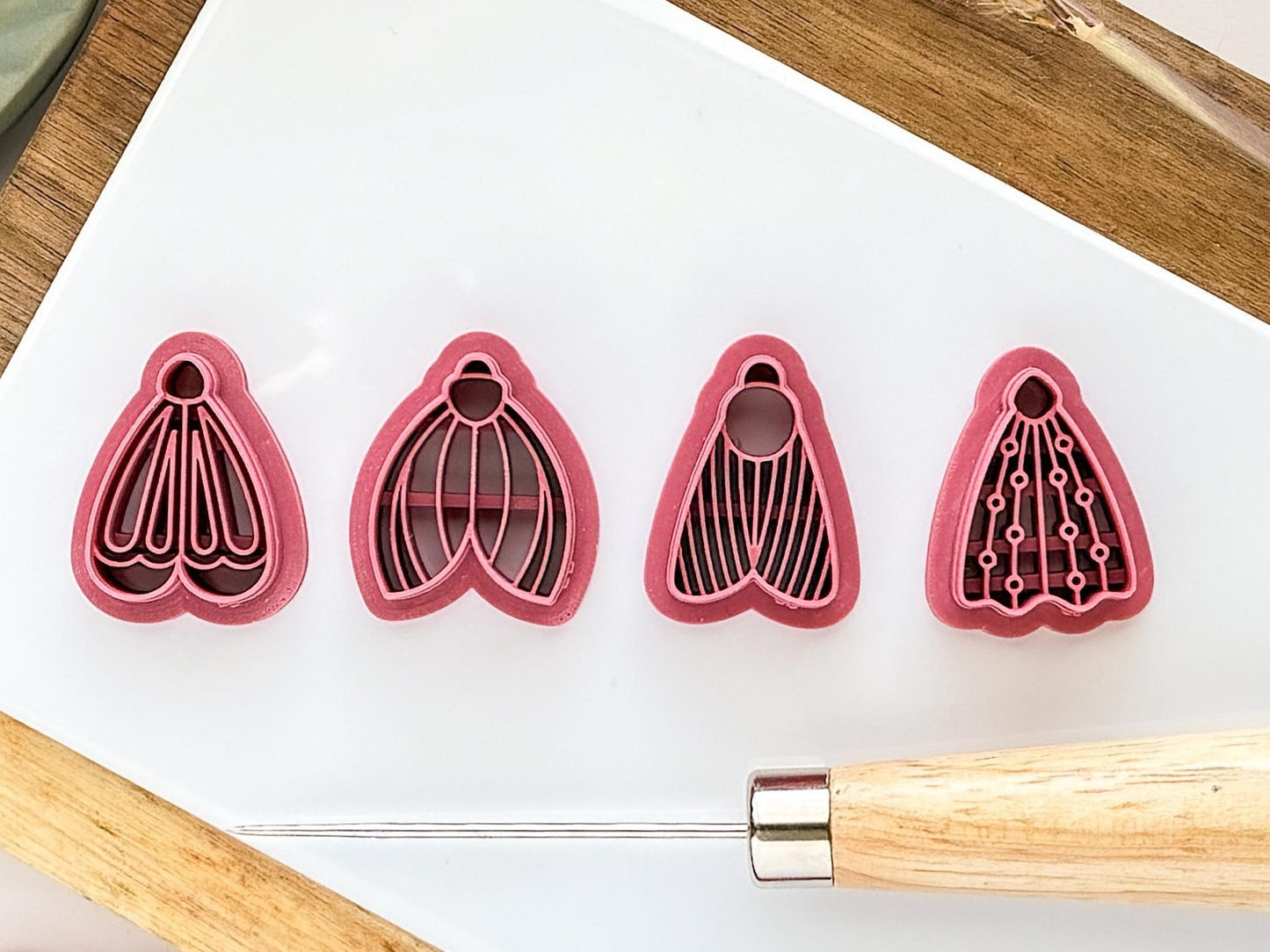 Set of 4 moth clay cutters in dark pink