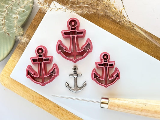 Sroup of 3 dark pink ships anchor clay cutters