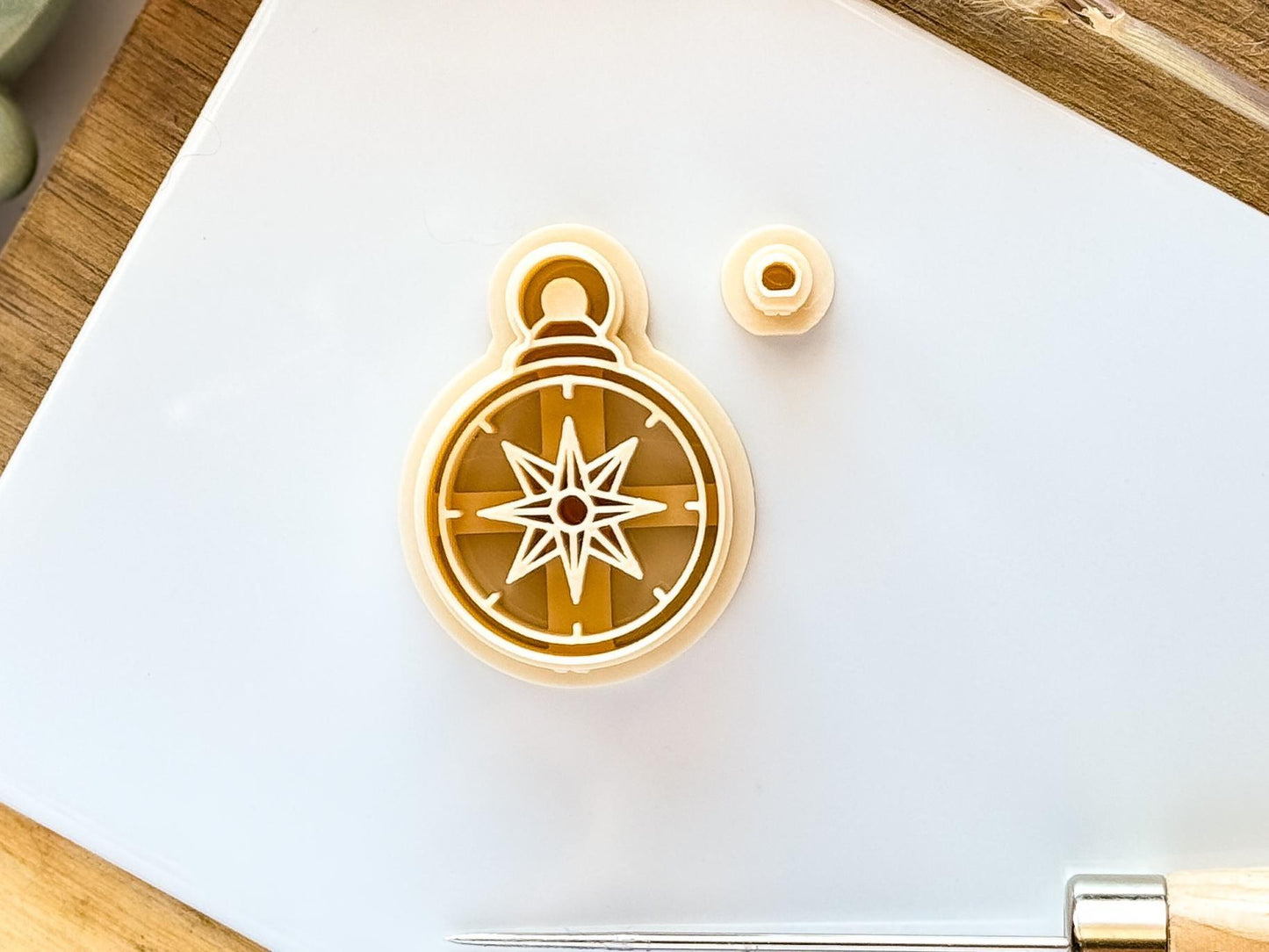 beige compass clay cutter along on tile