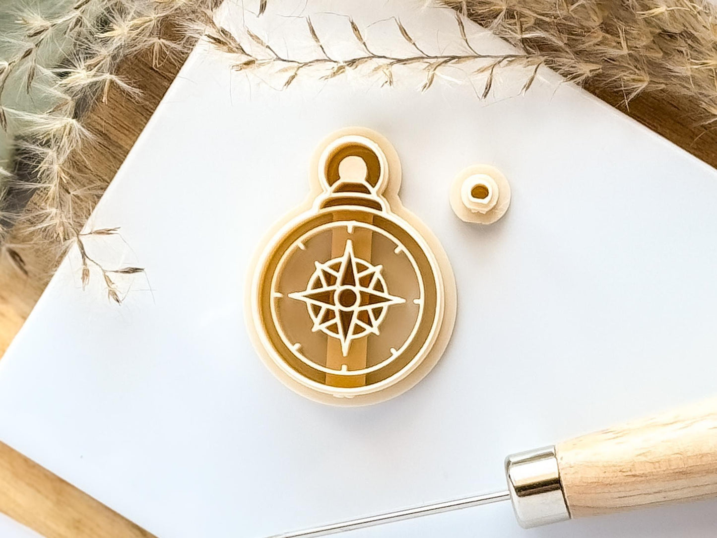 beige compass clay cutter