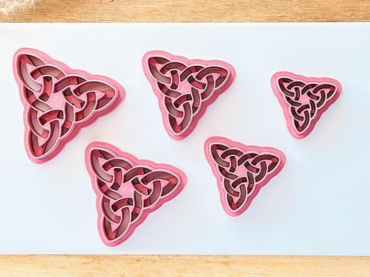 Various sizes of celtic knot triangle clay cutter