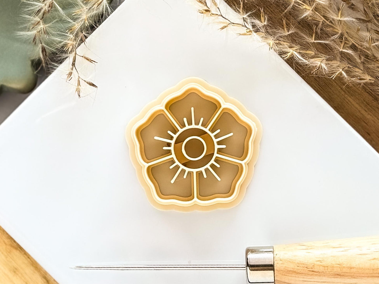 Flower tattoo style cutter in beige
