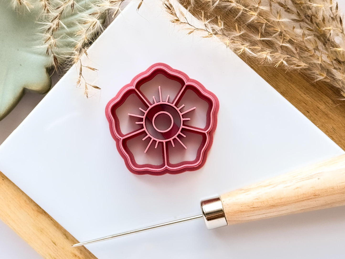 Flower tattoo style cutter in beige