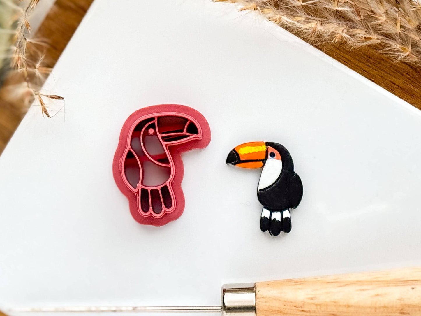 Toucan bird clay cutter facing forward.