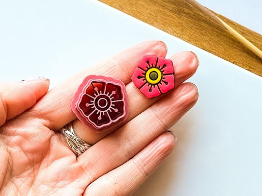 mm flower cutter in american tattoo style in hand for scale