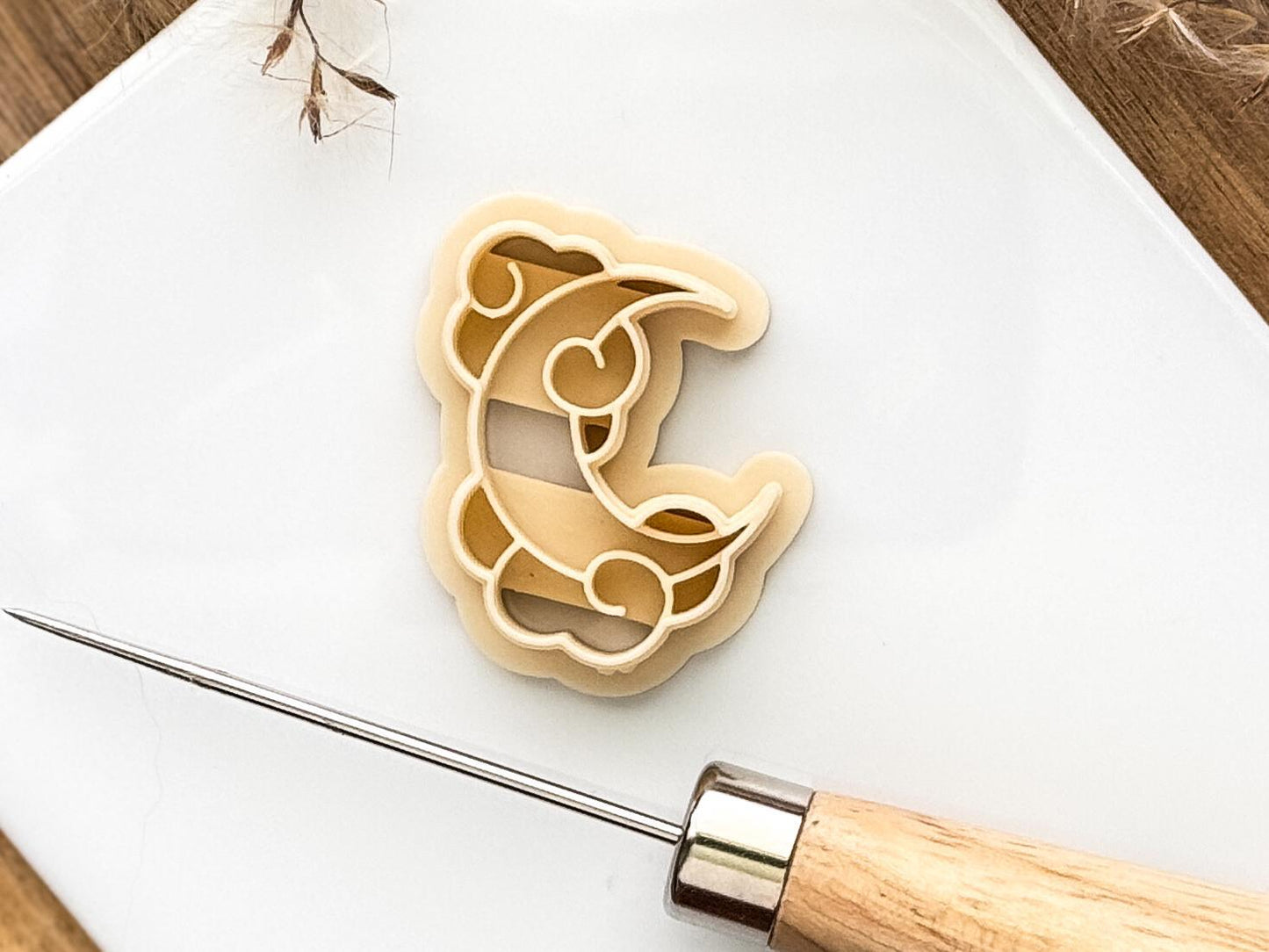 Beige crescent moon clay cutter
