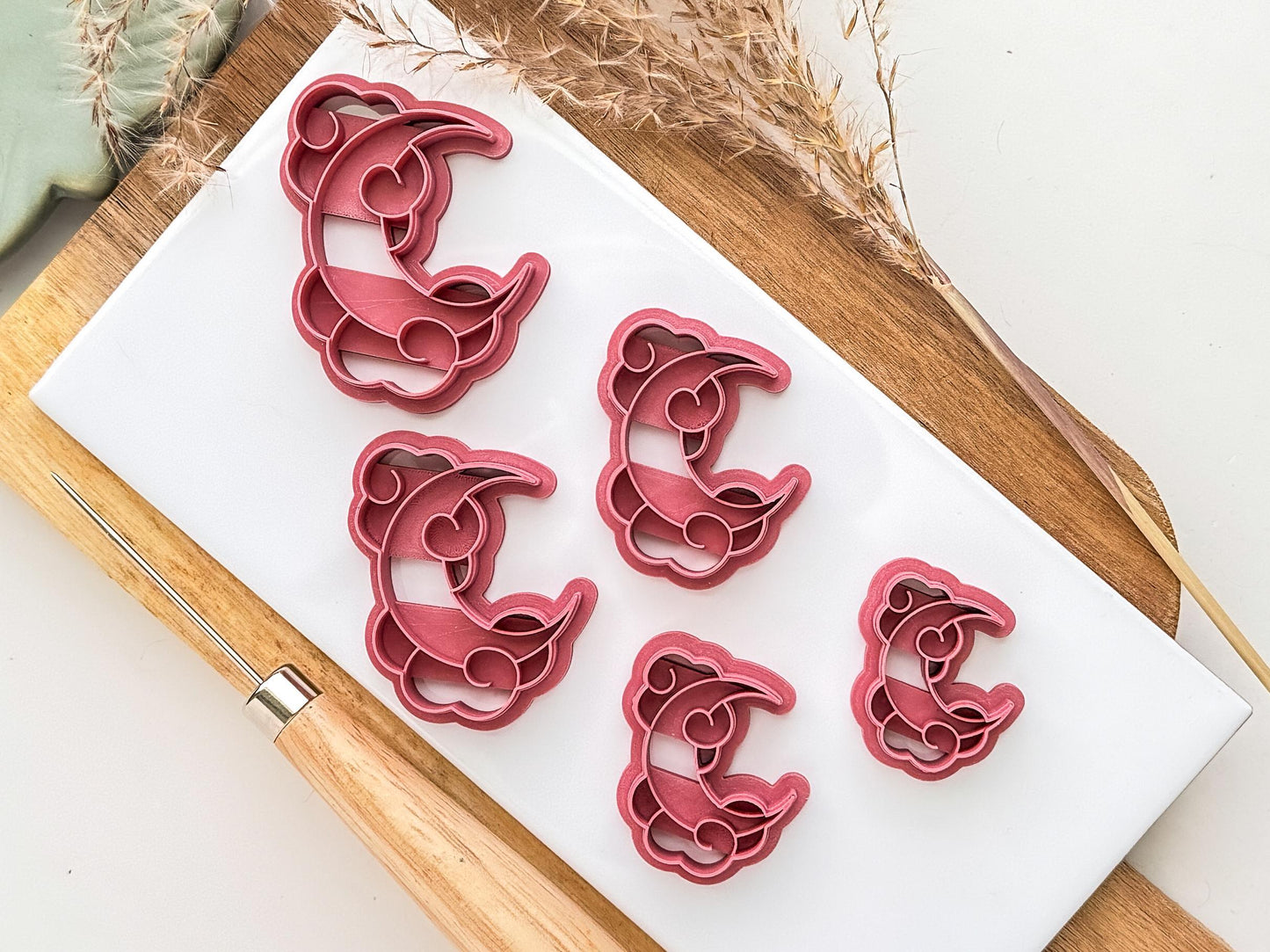 All sizes of moon and clouds clay cutter