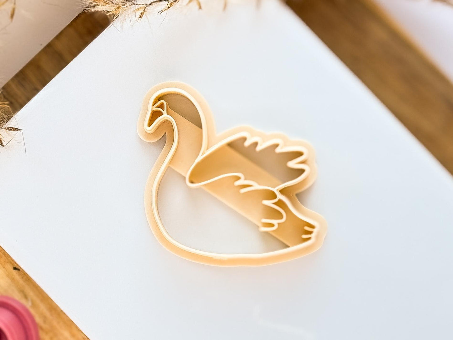 Beige coloured swan clay cutter