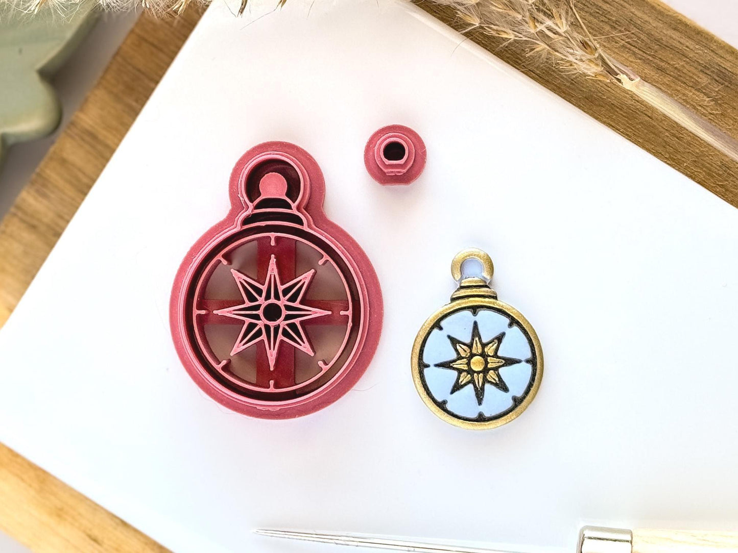 Deatiled compass clay cutter with cut out sample polymer clay piece