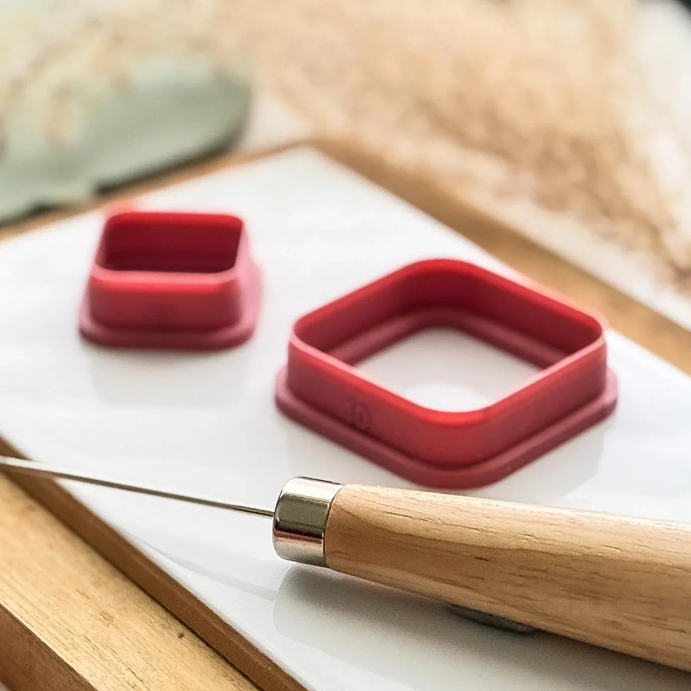 side view of sharp square clay cutters with roudned corners and a bevelled edge