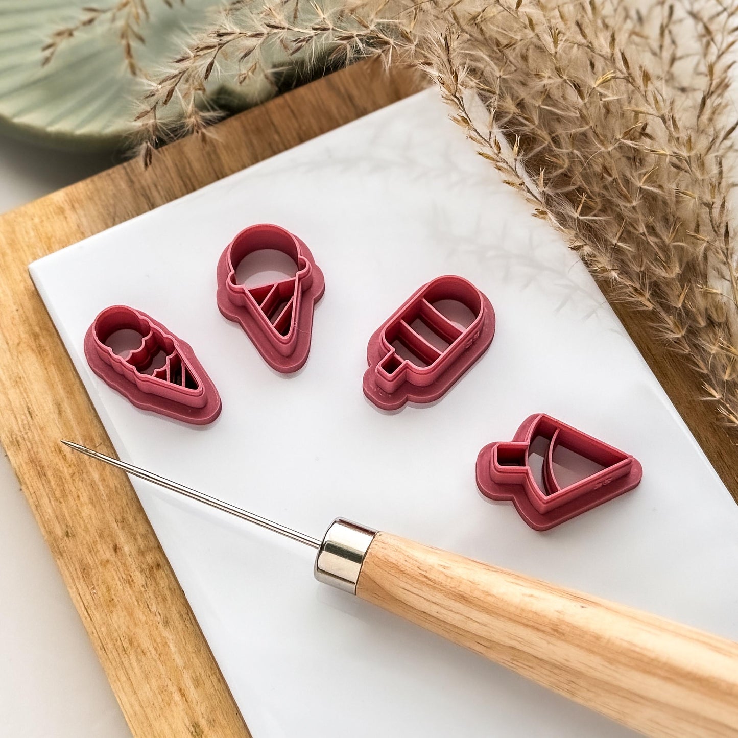 tilted view of summery ice cream clay cutter set