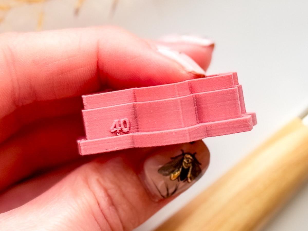 Clay cutter with size printed on the side