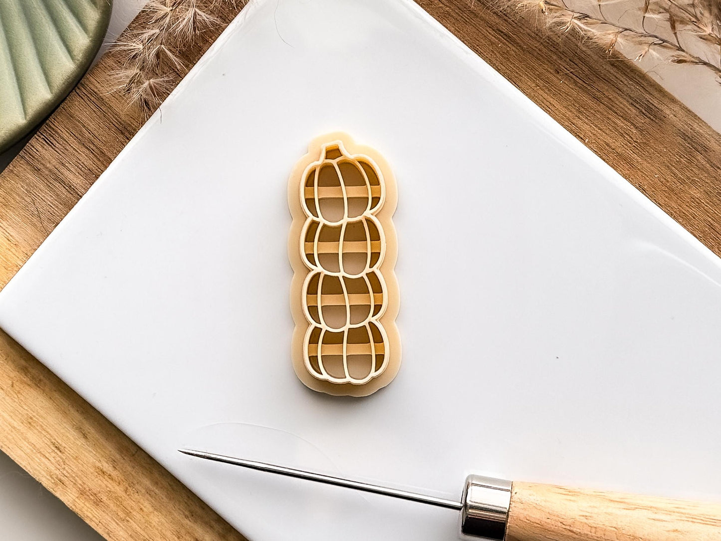 beige coloured stacked pumpkin polymer clay cutter