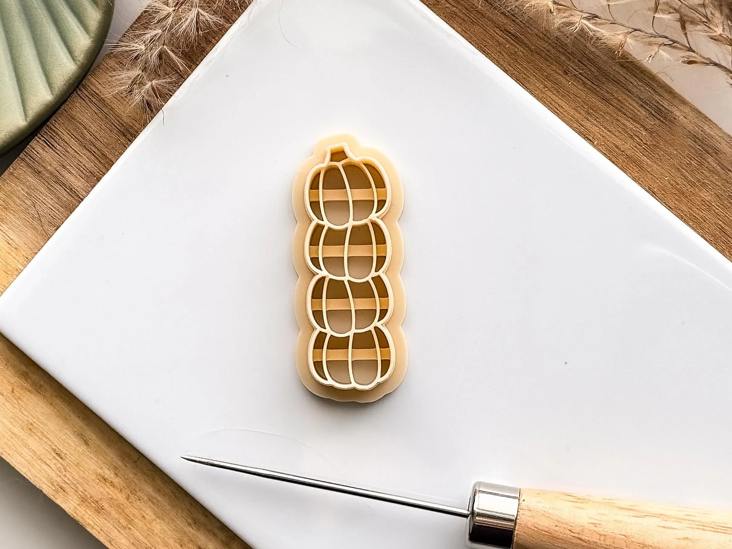 beige coloured stacked pumpkin polymer clay cutter