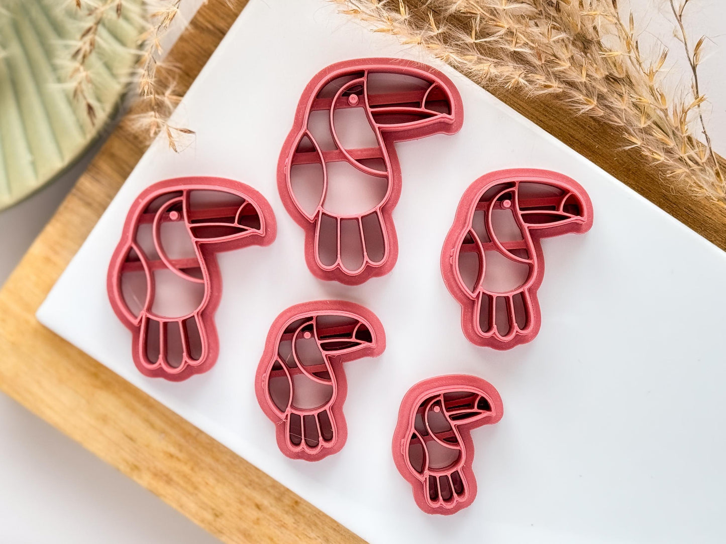 various sizes of tropical jungle bird cutter for polymer clay and dough