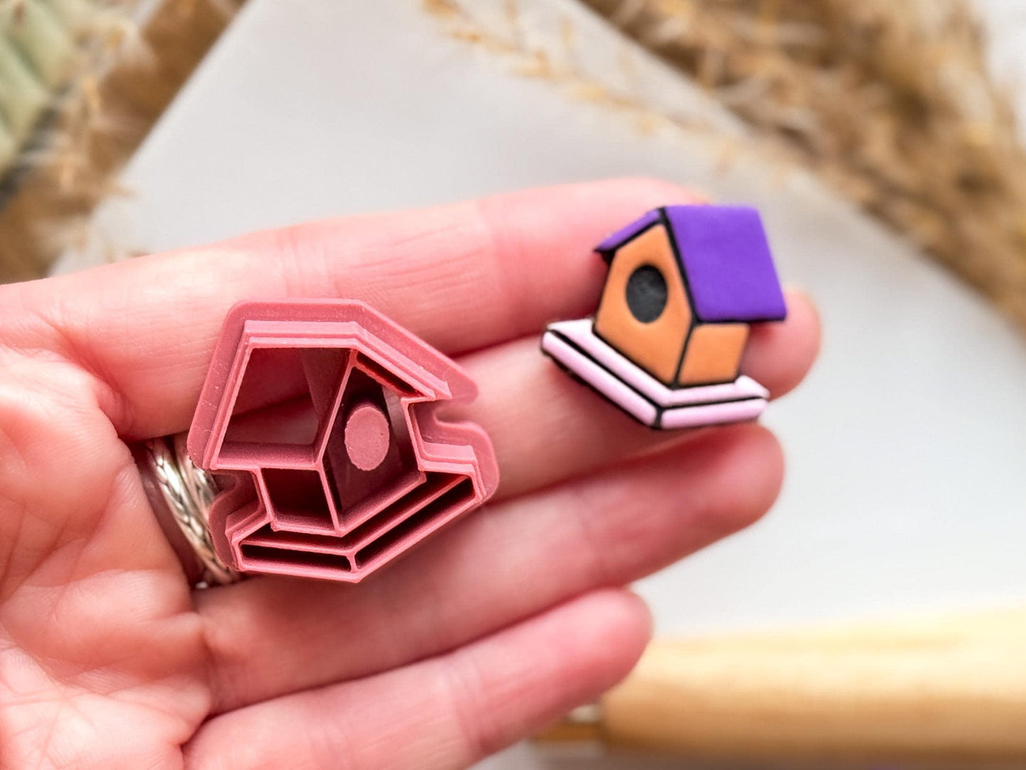 bird nest house clay cutter and sample polymer clay shape in hand