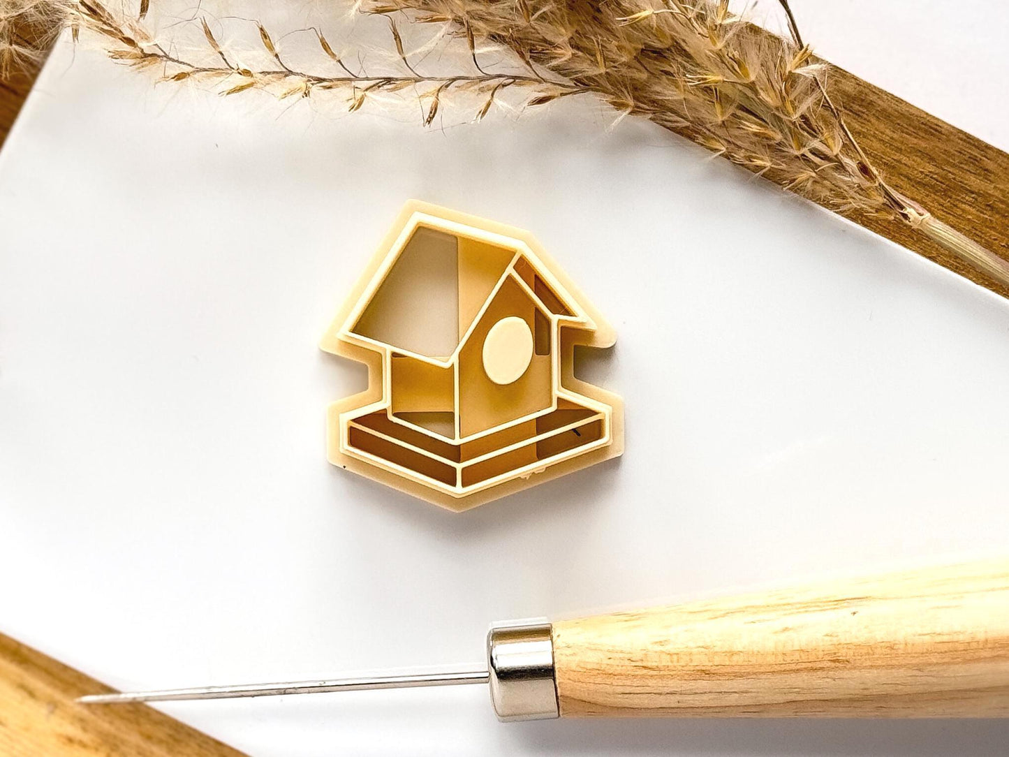 beige birdhouse clay cutter
