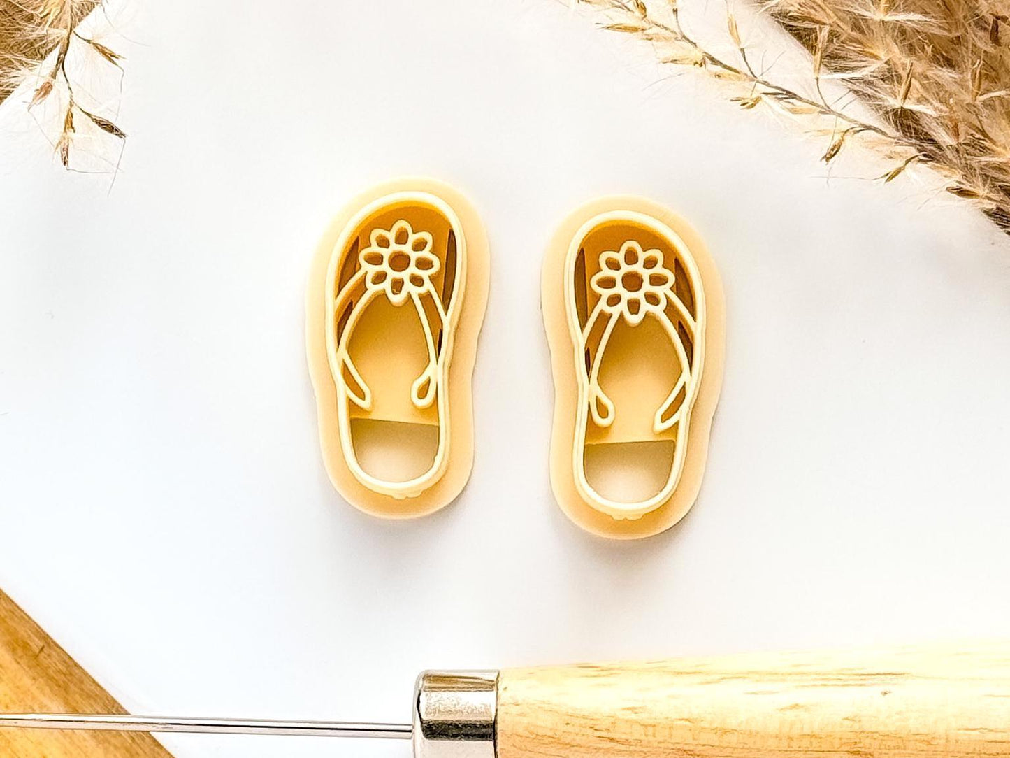 Mirrored sandal flip flop polymer clay cutters in beige with flower and strap imprint details