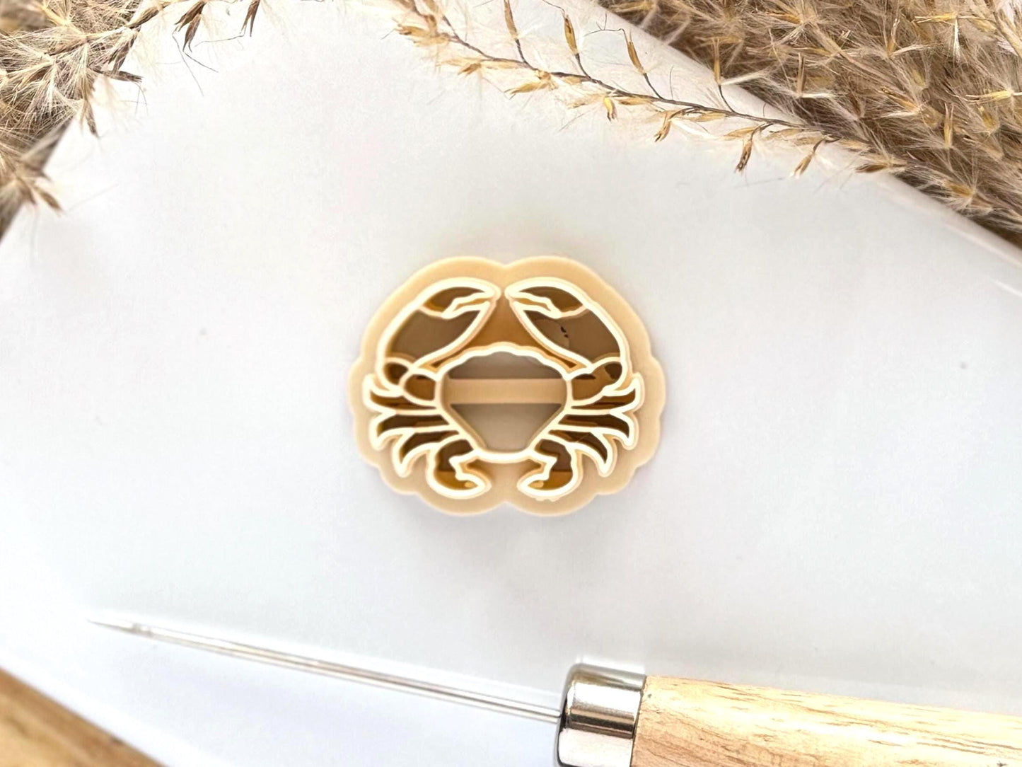 Beige coloured ocean themed clay cutter - crab shaped