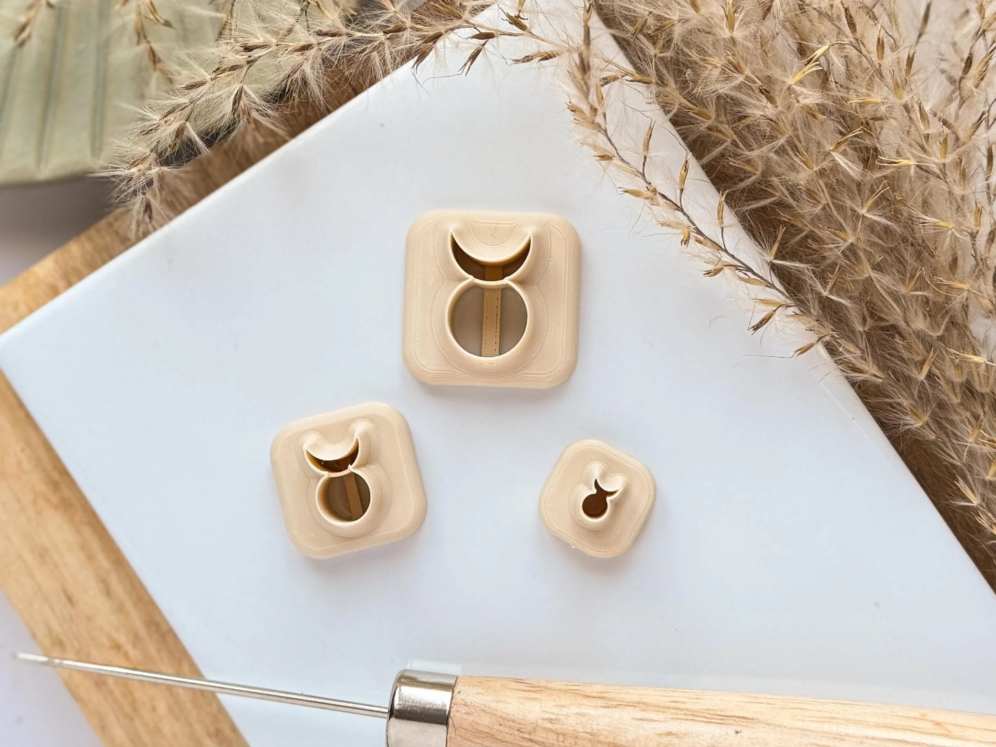 beige coloured witchy symbol clay cutters