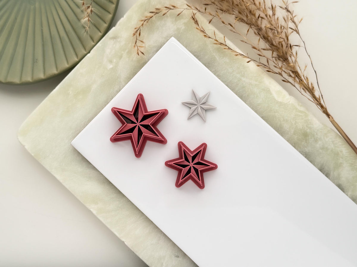 Six point star clay cutters in emo witchy style with debossed sections.