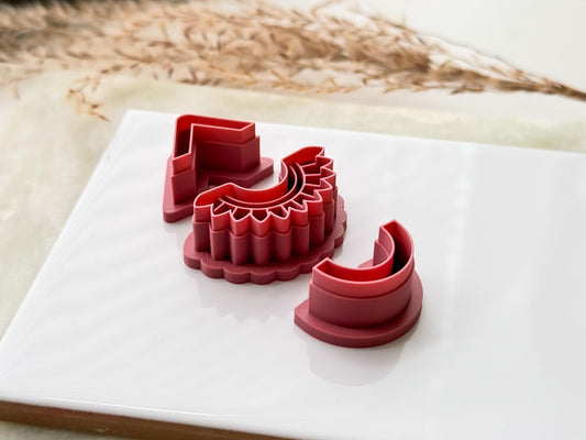 Side view of solace earring cutter set showing chevron, arch and tribal style cutters.