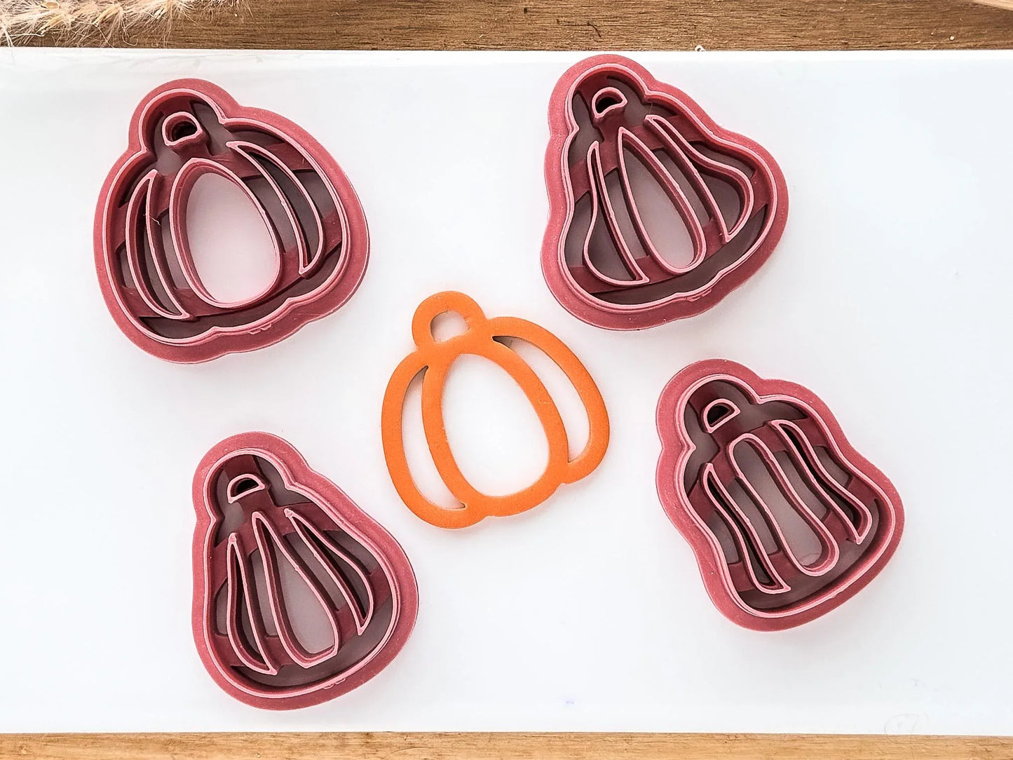 Set of 4 pumpkin clay cutters in an outline only style.