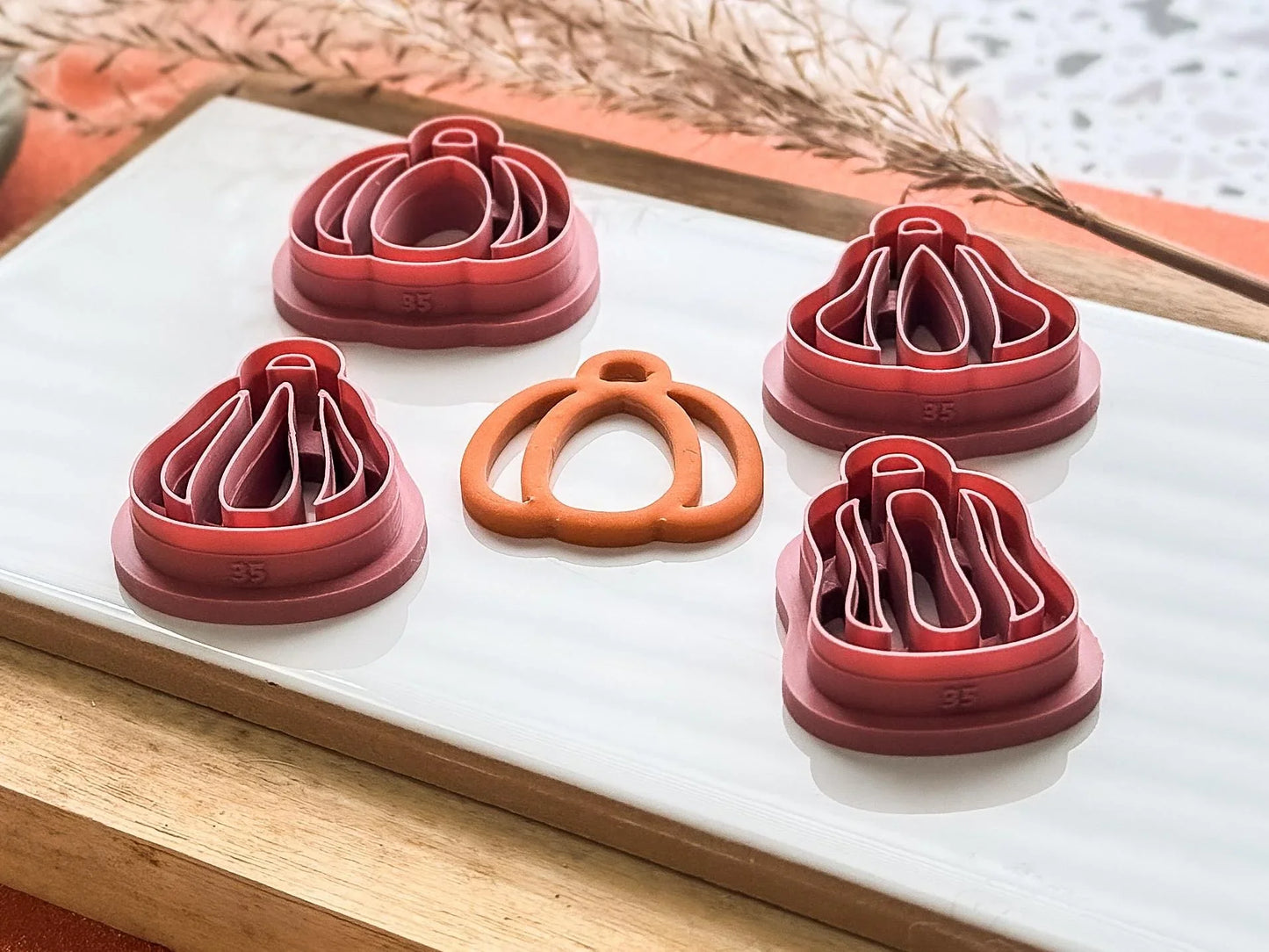 Side view of 4 outline pumpkin cutters for polymer clay