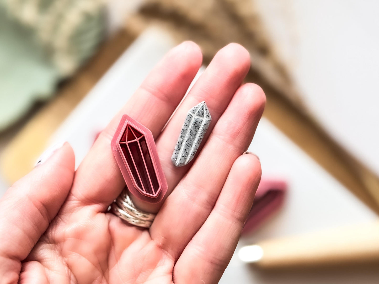 small crystal cutter in hand