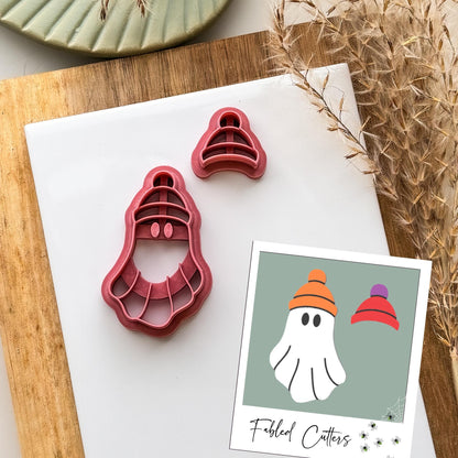 Polymer clay cutter in ghost shape with a bobble hat and separate hat cutter for changing textures and colours.
