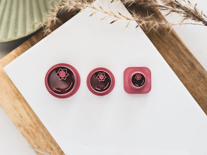 Blueberry shaped clay cutters with details in various small sizes