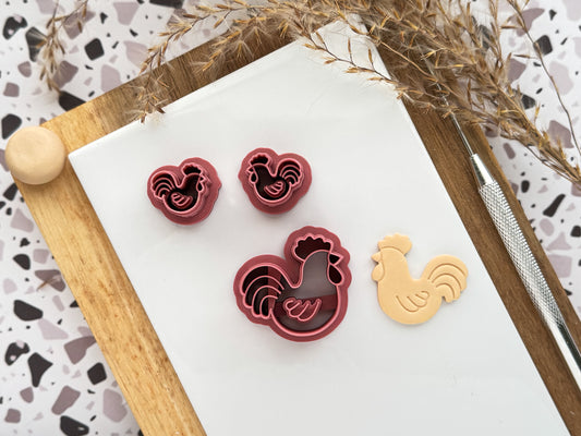 Easter rooster shaped clay cutter in small and large sizes with beige polymer clay cut out, pin tool and decorative elements